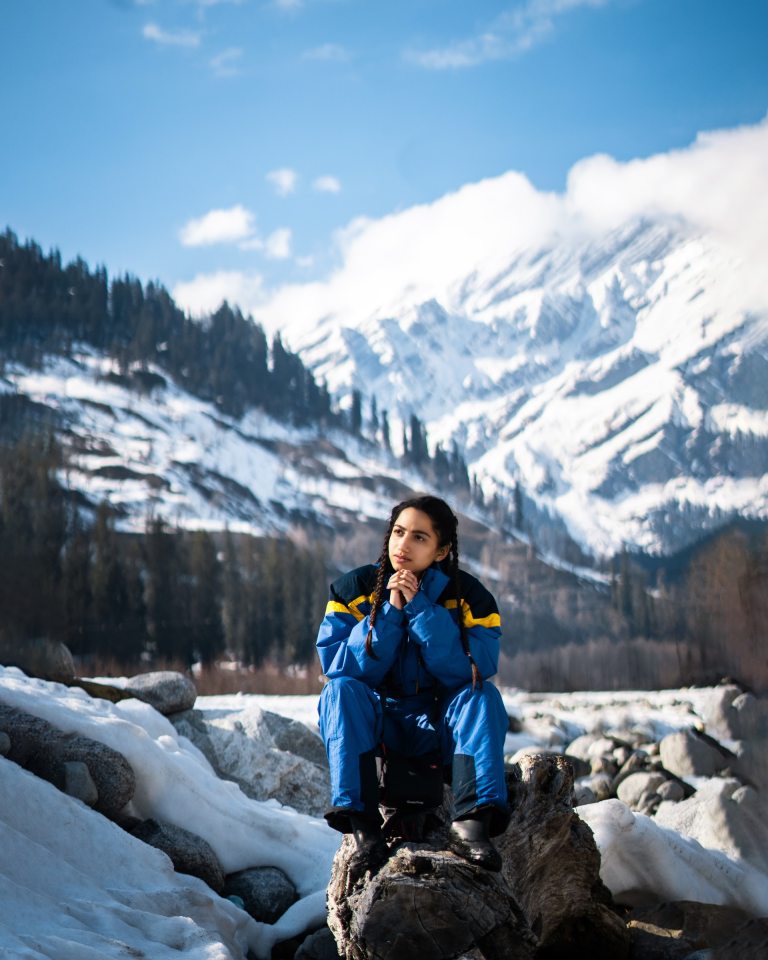 Girl Sitting On The Rock In Manali